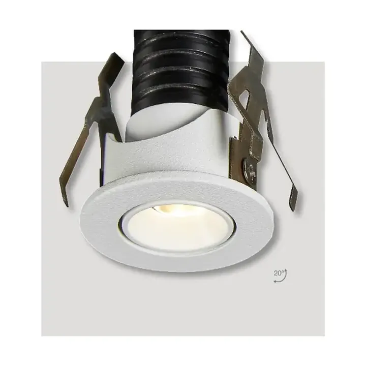 Alpha mini recessed spotlight with its spring clips extended