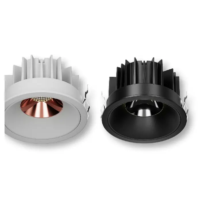 BOSCA V.3 downlights in white and black with rose-gold reflectors