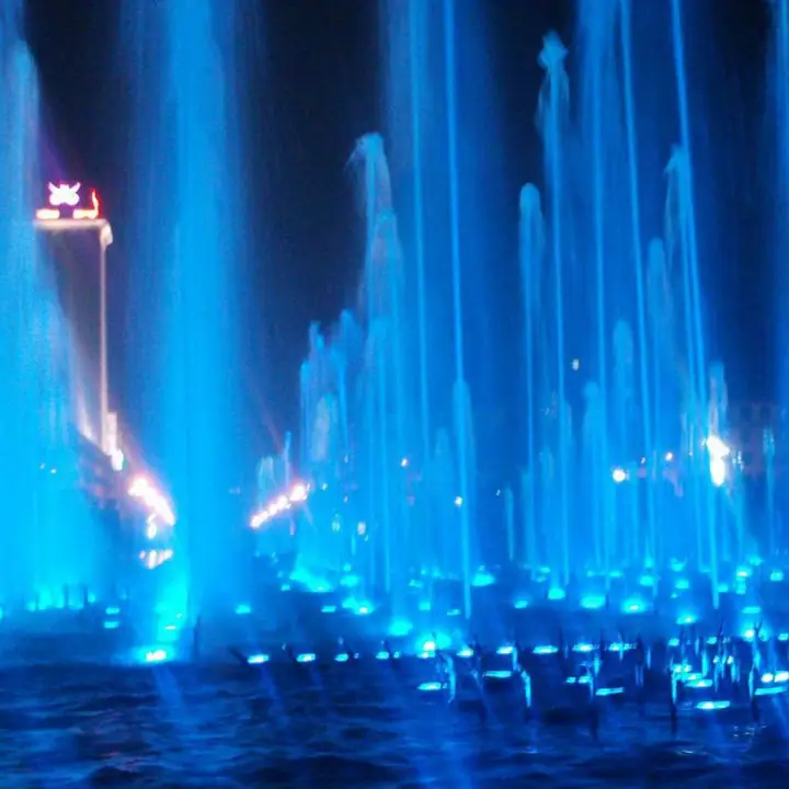 Braille underwater lights illuminating a fountain display