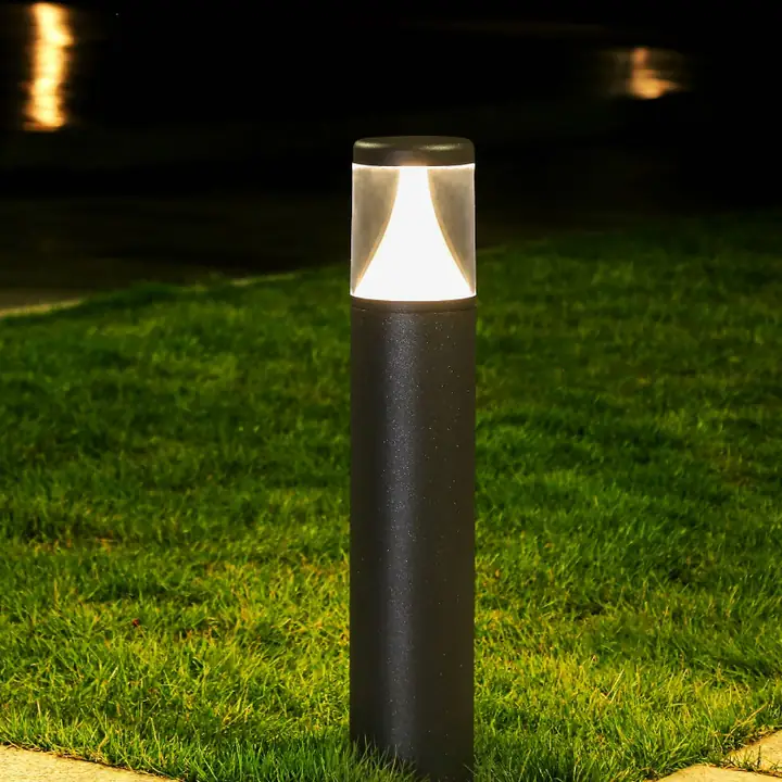 Comp bollard lighting a lawn edge