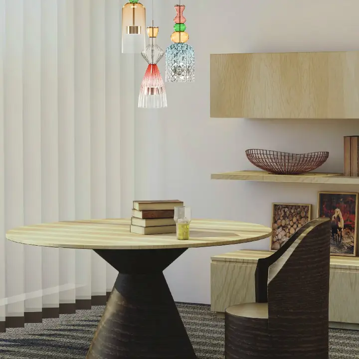 Infini pendants in pastel glass above a round table
