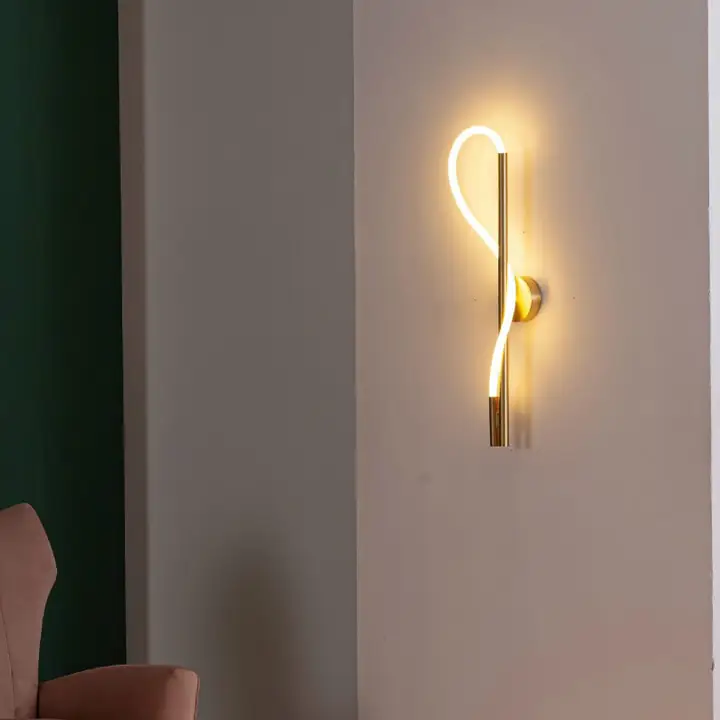 Pleko wall light curving across a dark green wall