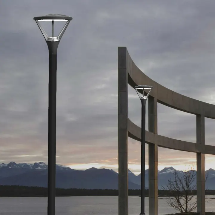 Scandia post-top luminaires silhouetted against a dusk sky
