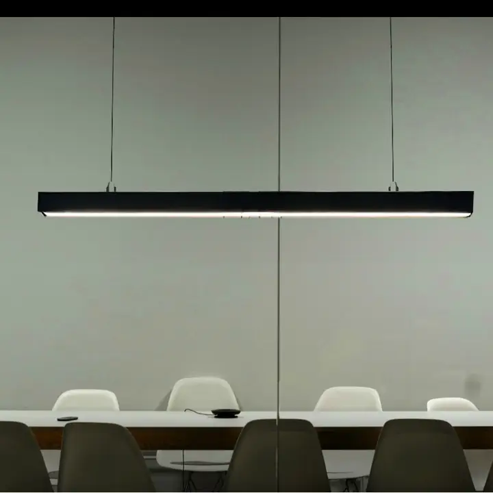 Tessera suspended linear light over a meeting table