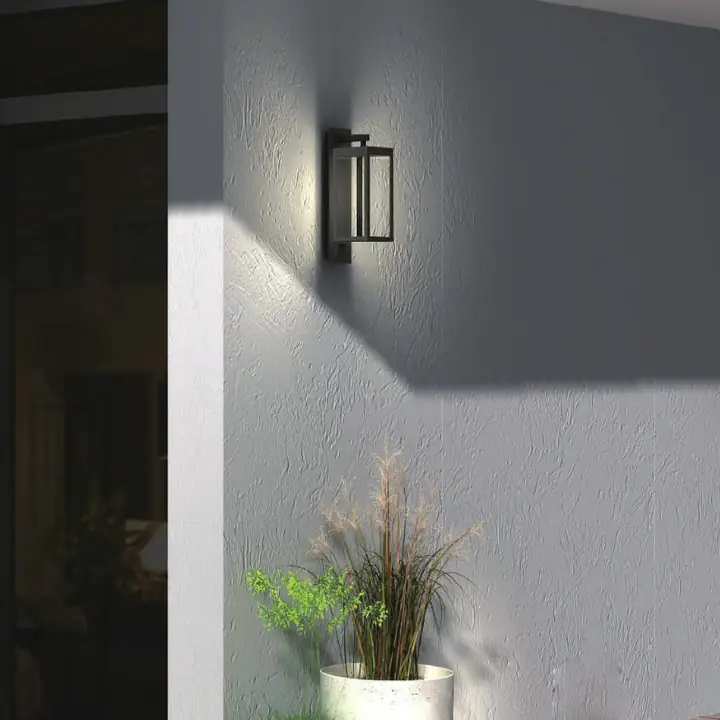 Tower glass-box sconce on a light grey wall