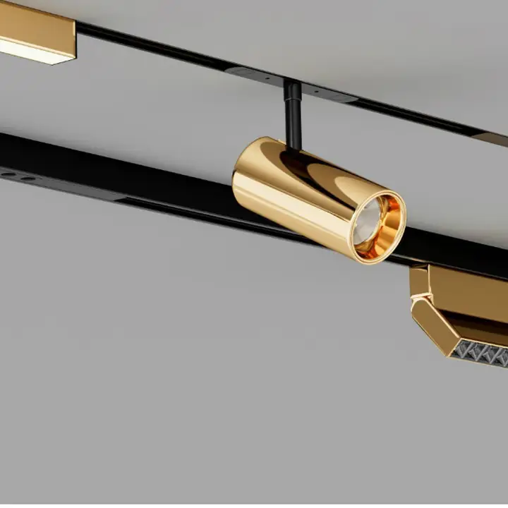 Tunable white magnetic track with brass spot and grille modules