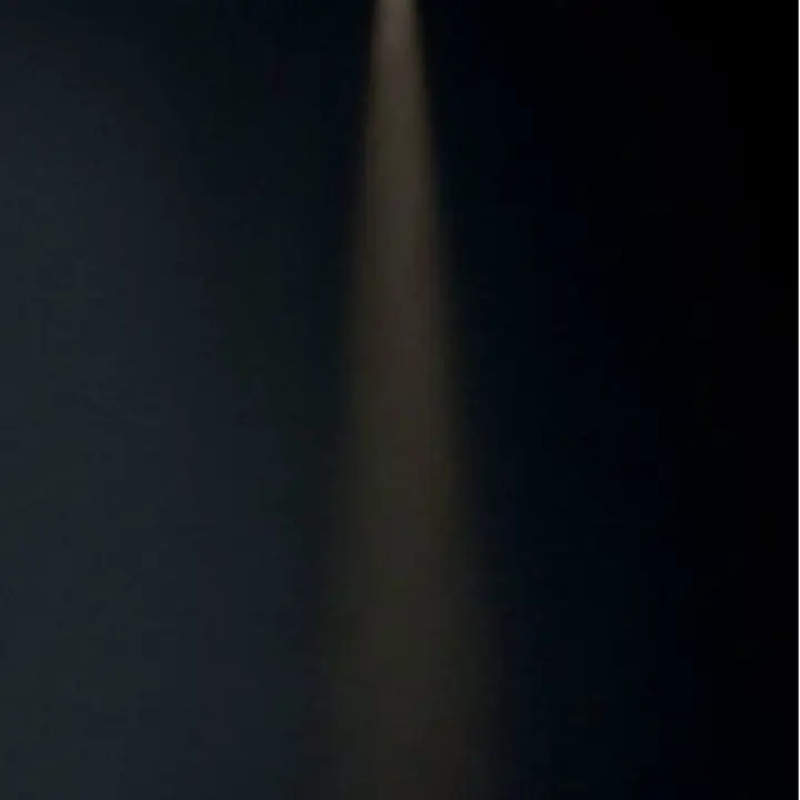 Venato spotlight throwing a narrow beam onto a sculpted bowl